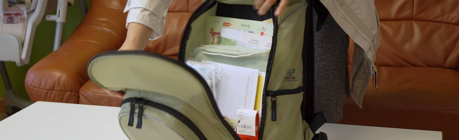 5.000ster Wiener Wickelrucksack übergeben