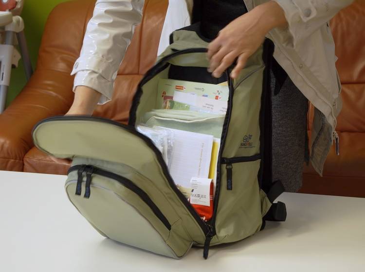 5.000ster Wiener Wickelrucksack übergeben